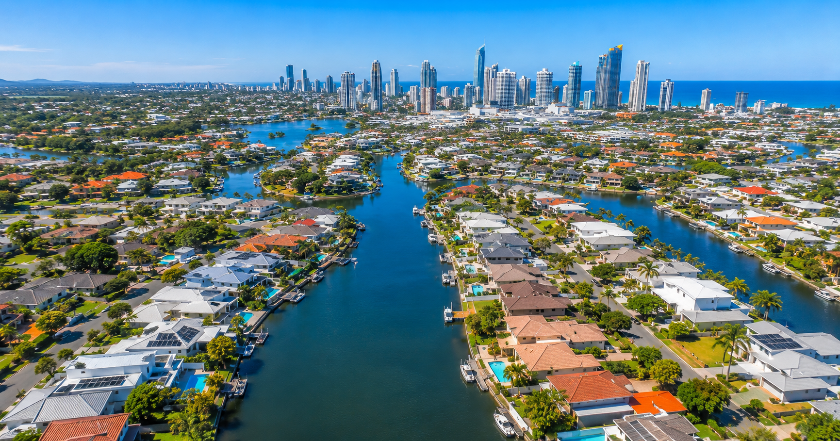 Aerial view of Mermaid Waters canal homes on the Gold Coast showcasing waterfront properties and lifestyle amenities.