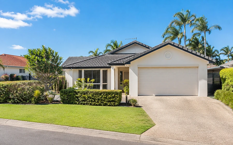 biggera waters houses final Biggera Waters buyers agent view of an established family house in a residential street