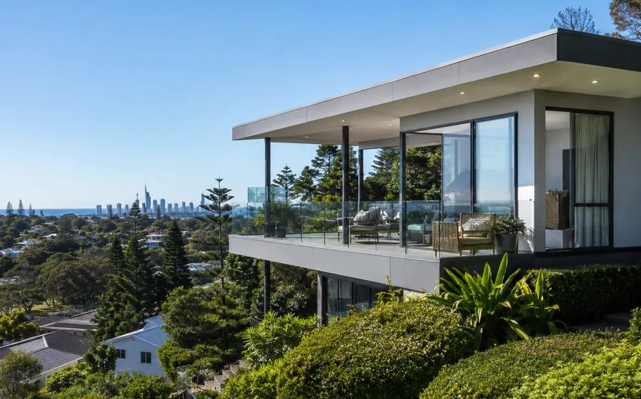 Elevated Burleigh Heads lifestyle property with coastal views and surrounding greenery.