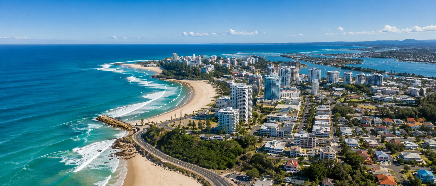 Coolangatta Buyers Agent aerial view of Coolangatta Beach, coastal apartments and the southern Gold Coast