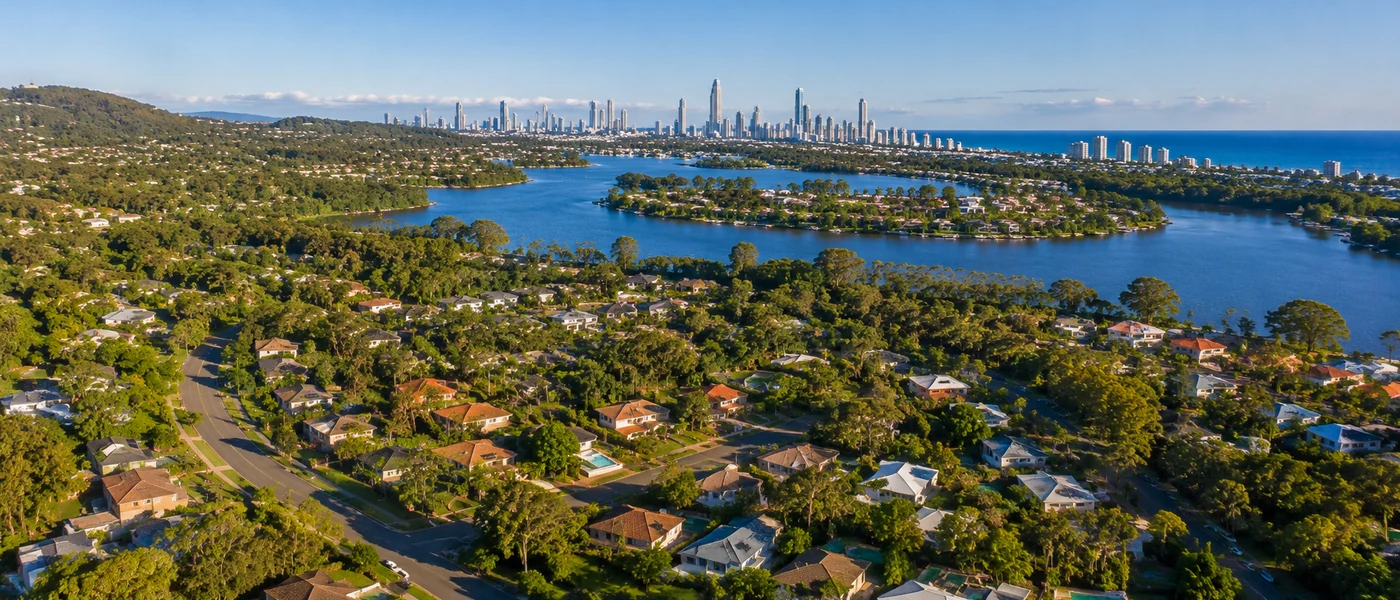 Elanora Buyers Agent aerial view of leafy residential areas, Pine Lake and the southern Gold Coast