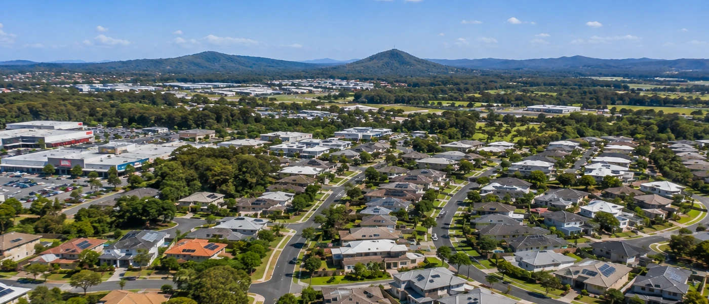 Ormeau Buyers Agent aerial view of established homes, newer estates and green northern Gold Coast surroundings