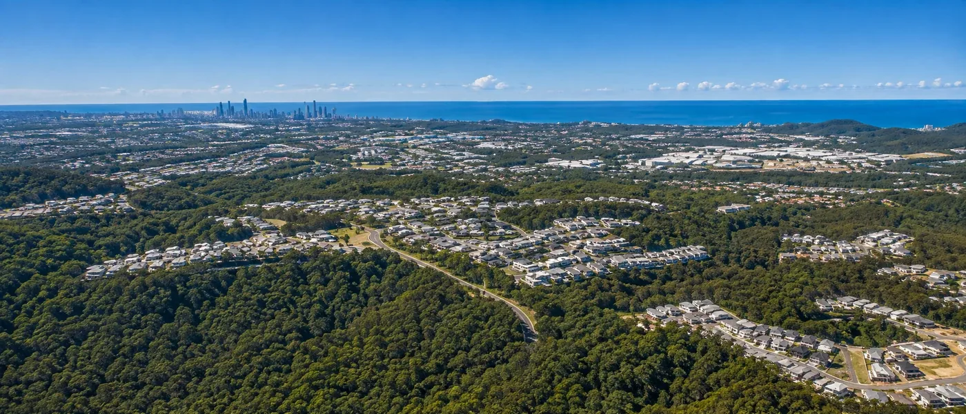 Reedy Creek Buyers Agent aerial view of leafy residential estates, family homes and elevated southern Gold Coast surroundings