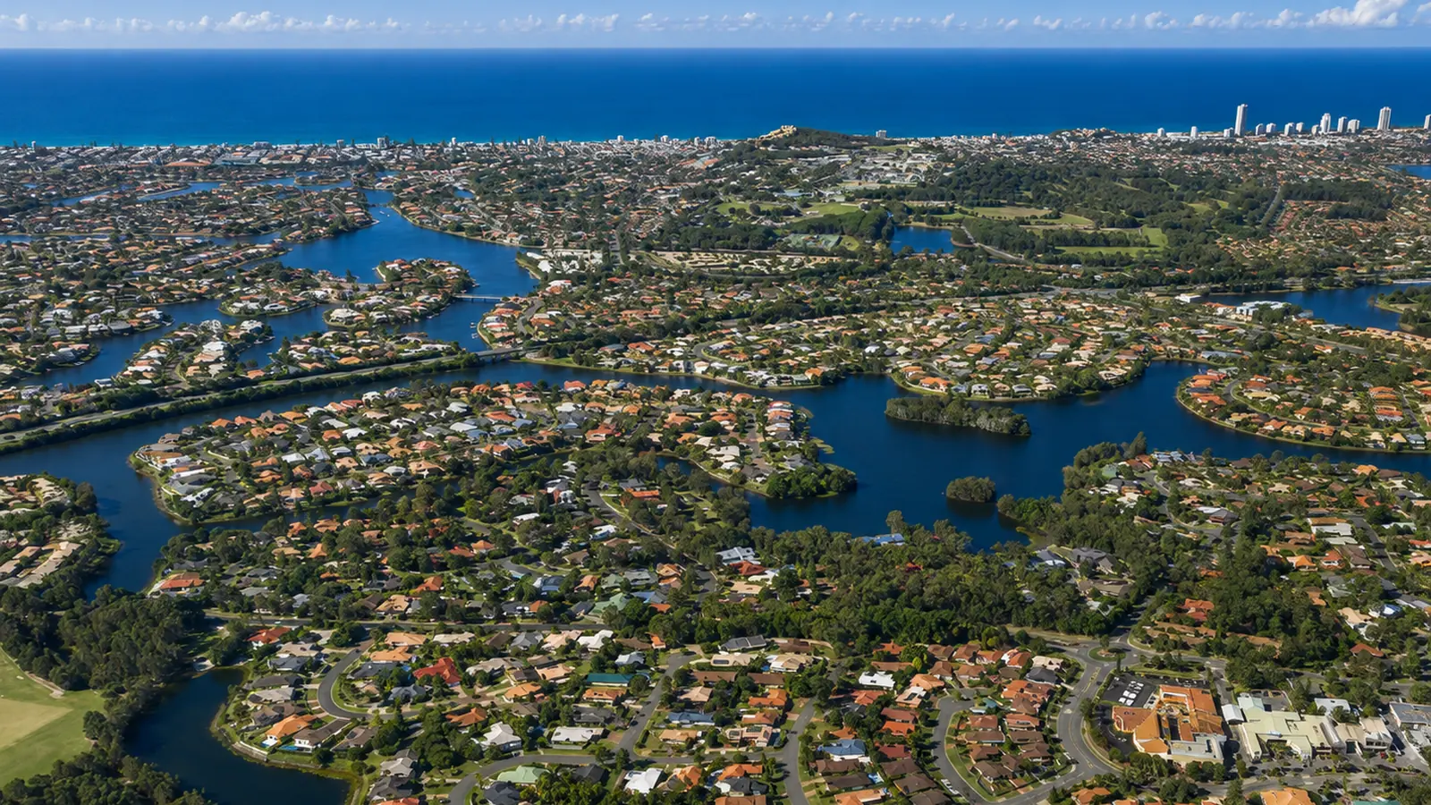 Aerial view of Robina waterways, homes and lifestyle property.