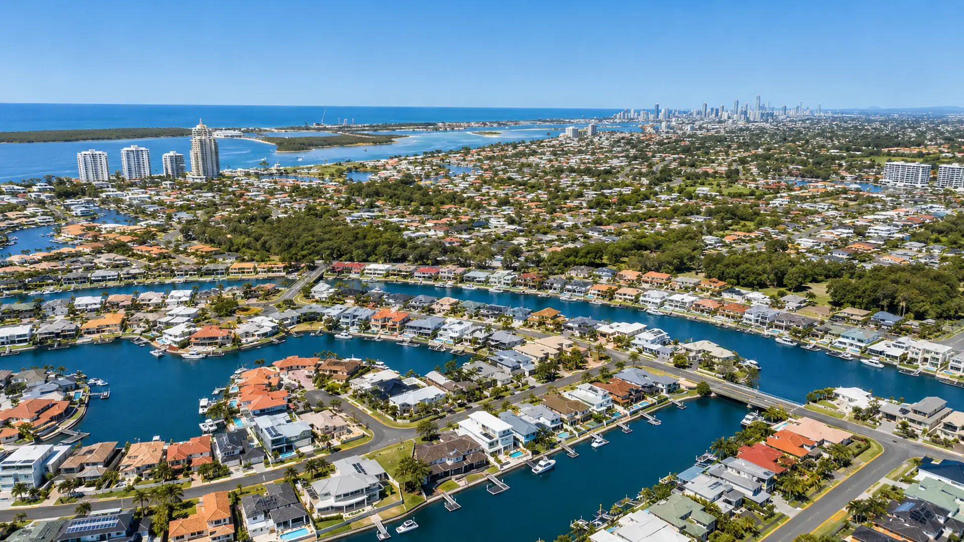 Runaway Bay buyers agent aerial view of canals, waterfront homes and the Broadwater