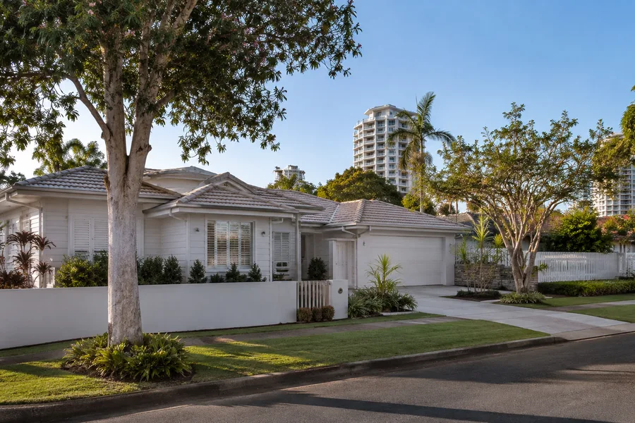 southport houses Southport buyers agent view of an established house in a leafy residential street